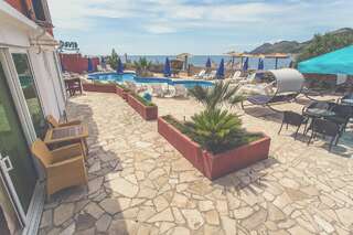 Апартаменты Apartments Atlantis Добра-Вода Двухместный номер с 1 кроватью с видом на море-1